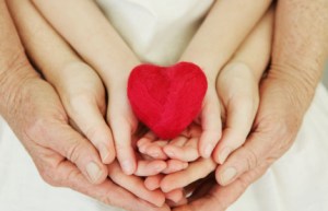 family-hands-heart